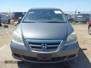 2007 Honda Odyssey EX-L z VIN 5FNRL38797B137595, wystawiony jako IAAI lot #42002233 z przebiegiem 192 296 mil mil oraz . Historia ofert i sprzedaży dostępna na DreamBid. Obrazek 12.