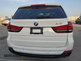 2014 BMW X5 xDrive35d z VIN 5UXKS4C53E0C07301, wystawiony jako Copart lot #54429095 z przebiegiem 106 050 mil mil oraz Szkoda całkowita • Salvage title. Historia ofert i sprzedaży dostępna na DreamBid. Obrazek 6.