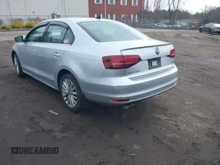 2016 Volkswagen Jetta Sedan 1.8T SEL with VIN 3VWL17AJ2GM345609, listed as a IAAI auction lot 41628557 with 144,038 mi miles. Bid and sale history available at carsss.com. Image 1.