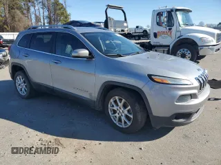 2014 Jeep Cherokee Latitude with VIN 1C4PJLCS5EW245150, listed as a Copart auction lot 52128325 with 150,743 mi miles and Clean Title. Bid and sale history available at carsss.com. Image 4.