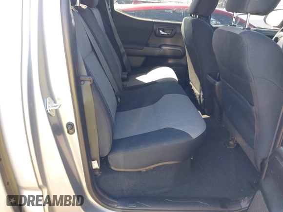 2021 Toyota Tacoma SR5 with VIN 3TMAZ5CN5MM156116, listed as a IAAI auction lot 42017208 with 34,410 mi miles and . Bid and sale history available at DreamBid. Image 8.