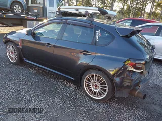 2008 Subaru Impreza Wagon (Natl) STI with VIN JF1GR89648L829468, listed as a IAAI auction lot 41253904 with 143,184 mi miles. Bid and sale history available at carsss.com. Image 3.