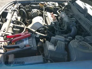 1990 Toyota Camry z VIN JT2SV21E9L3397994, wystawiony jako IAAI lot #41010855 z przebiegiem 261 457 mil mil oraz . Historia ofert i sprzedaży dostępna na DreamBid. Obrazek 11.