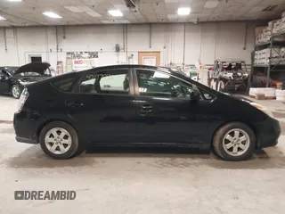 2005 Toyota Prius z VIN JTDKB20U953034977, wystawiony jako IAAI lot #42177898 z przebiegiem 199 079 mil mil oraz . Historia ofert i sprzedaży dostępna na DreamBid. Obrazek 14.
