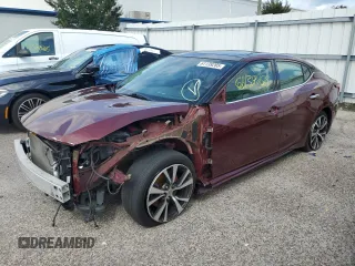 2016 Nissan Maxima SL with VIN 1N4AA6AP3GC434945, listed as a Copart auction lot 61139285 with 99,189 mi miles and Salvage title. Bid and sale history available at DreamBid. Image 1.
