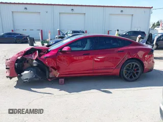 2023 Tesla Model S Plaid с VIN 5YJSA1E61PF525637, выставлен на аукционе IAAI как лот 42045459 с пробегом Не указан миль и . История ставок и продаж доступна на DreamBid. Изображение 14.