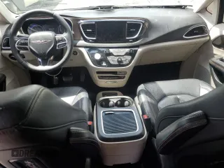 2017 Chrysler Pacifica Touring L Plus with VIN 2C4RC1EG3HR782368, listed as a Copart auction lot 52830615 with 98,621 mi miles and Salvage Title. Bid and sale history available at DreamBid. Image 8.