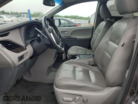 2015 Toyota Sienna XLE with VIN 5TDYK3DC7FS647939, listed as a Copart auction lot 60900055 with 249,551 mi miles and Clean title. Bid and sale history available at DreamBid. Image 7.