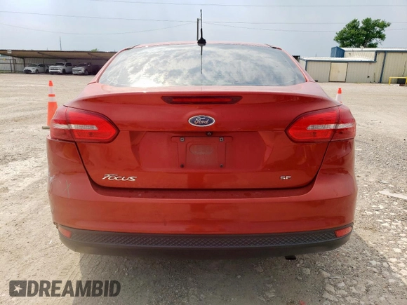 2018 Ford Focus SE with VIN 1FADP3F26JL302454, listed as a Copart auction lot 57023535 with 45,592 mi miles and Salvage title. Bid and sale history available at DreamBid. Image 6.