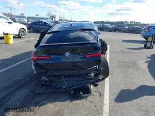 2020 BMW X4 M Competition with VIN 5YMUJ0C08LLA99688, listed as a IAAI auction lot 41226234 with 63,497 mi miles. Bid and sale history available at carsss.com. Image 15.