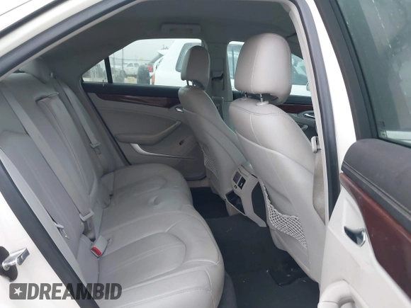 2013 Cadillac CTS Luxury z VIN 1G6DE5E53D0178112, wystawiony jako IAAI lot #41753094 z przebiegiem 262 955 mil mil oraz . Historia ofert i sprzedaży dostępna na DreamBid. Obrazek 8.