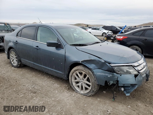 2012 Ford Fusion SEL with VIN 3FAHP0JA7CR355893, listed as a Copart auction lot 49988215 with 169,995 mi miles and Salvage Title. Bid and sale history available at carsss.com. Image 4.