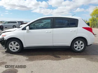 2009 Nissan Versa 1.8 S with VIN 3N1BC13E19L371006, listed as a IAAI auction lot 42064633 with 67,424 mi miles. Bid and sale history available at carsss.com. Image 15.