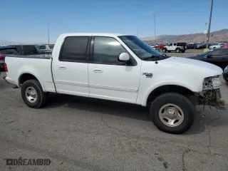 2001 Ford F-150 SuperCrew XLT with VIN 1FTRW08L51KB76553, listed as a Copart auction lot 75202514 with 324,064 mi miles and Salvage Title. Bid and sale history available at carsss.com. Image 4.