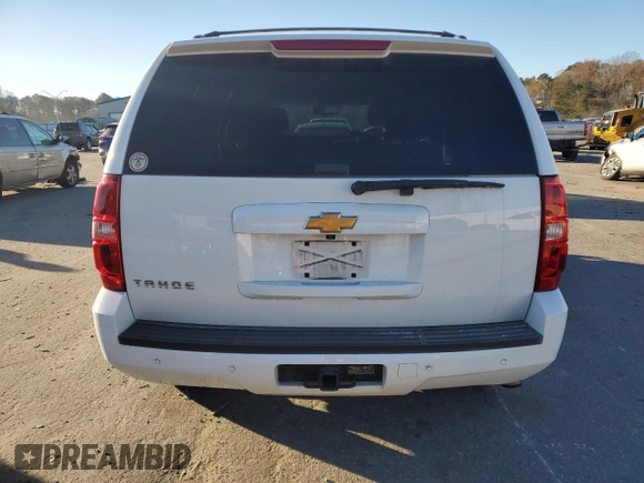 2013 Chevrolet Tahoe LS with VIN 1GNSCAE09DR340125, listed as a Copart auction lot 82894734 with 214,909 mi miles and Salvage title. Bid and sale history available at DreamBid. Image 6.
