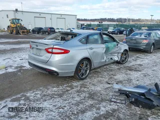 2016 Ford Fusion Titanium with VIN 3FA6P0K96GR101285, listed as a IAAI auction lot 41214633 with 113,633 mi miles and . Bid and sale history available at carsss.com. Image 4.