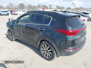 2018 Kia Sportage EX with VIN KNDPN3AC7J7373183, listed as a IAAI auction lot 41169417 with 174,423 mi miles and . Bid and sale history available at DreamBid. Image 3.