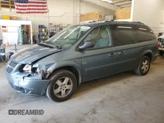 2005 Dodge Caravan SXT with VIN 2D4GP44L85R524079, listed as a Copart auction lot 63490555 with 116,857 mi miles and Salvage title. Bid and sale history available at DreamBid. Image 1.