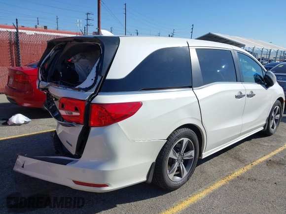 2018 Honda Odyssey Touring with VIN 5FNRL6H8XJB019122, listed as a IAAI auction lot 41820212 with 144,014 mi miles. Bid and sale history available at carsss.com. Image 20.