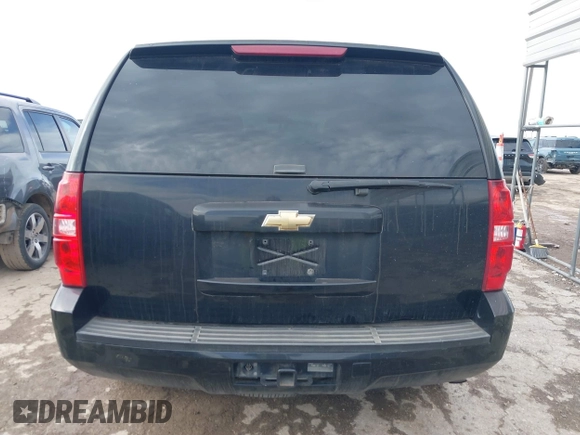2011 Chevrolet Tahoe Commercial with VIN 1GNLC2E00BR325388, listed as a IAAI auction lot 41472731 with 265,781 mi miles and . Bid and sale history available at DreamBid. Image 17.