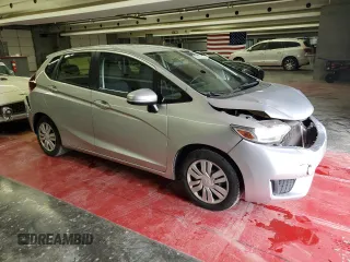 2016 Honda Fit LX with VIN JHMGK5H50GX005947, listed as a Copart auction lot 57699275 with 103,698 mi miles and Salvage title. Bid and sale history available at DreamBid. Image 4.