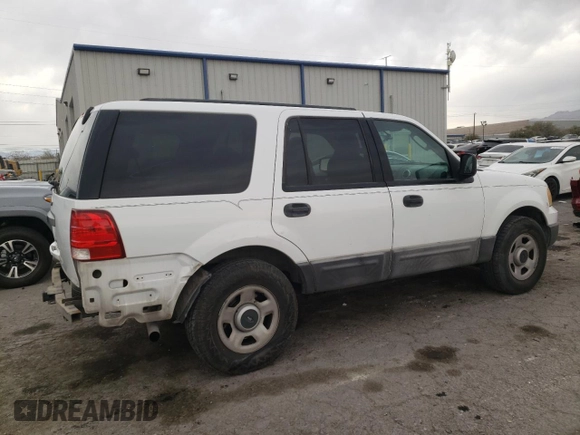 2004 Ford Expedition XLS with VIN 1FMRU13W74LB40774, listed as a Copart auction lot 84467024 with 217,945 mi miles and Salvage Title. Bid and sale history available at carsss.com. Image 3.
