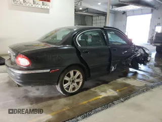 2003 Jaguar X-Type 3.0L z VIN SAJEA51C33WD25630, wystawiony jako Copart lot #57795475 z przebiegiem 135 514 mil mil oraz Szkody całkowita. Historia ofert i sprzedaży dostępna na DreamBid. Obrazek 3.