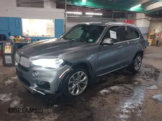 2018 BMW X5 xDrive35i with VIN 5UXKR0C53J0Y03214, listed as a IAAI auction lot 41509082 with 92,552 mi miles. Bid and sale history available at carsss.com. Image 2.