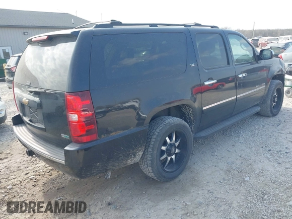 2011 Chevrolet Suburban LTZ with VIN 1GNSKKE39BR303754, listed as a IAAI auction lot 42070374 with 207,824 mi miles and . Bid and sale history available at DreamBid. Image 4.