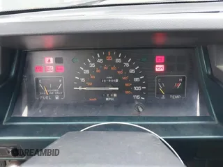 1992 Mitsubishi Mighty Max z VIN JA7FL24W5NP011633, wystawiony jako IAAI lot #41864873 z przebiegiem 301 895 mil mil oraz . Historia ofert i sprzedaży dostępna na DreamBid. Obrazek 7.