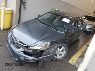 2005 Honda Accord EX with VIN JHMCM56755C007601, listed as a IAAI auction lot 41209511 with 238,715 mi miles and . Bid and sale history available at DreamBid. Image 17.