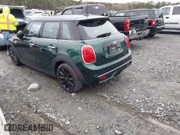 2016 MINI Cooper Hardtop 4 Door S with VIN WMWXU3C58G2D31595, listed as a IAAI auction lot 41267547 with 145,191 mi miles. Bid and sale history available at carsss.com. Image 3.