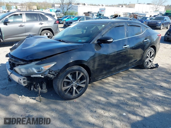 2016 Nissan Maxima SL with VIN 1N4AA6AP3GC408894, listed as a IAAI auction lot 42051320 with 128,516 mi miles and . Bid and sale history available at DreamBid. Image 2.