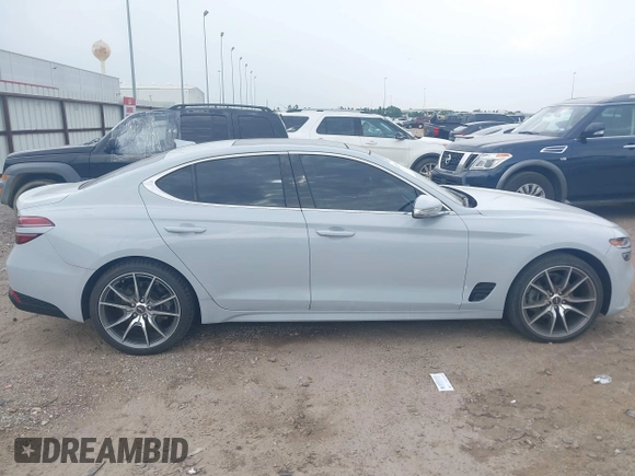 2022 Genesis G70 2.0T with VIN KMTG34TA9NU090218, listed as a IAAI auction lot 42437863 with 18,913 mi miles and . Bid and sale history available at DreamBid. Image 13.