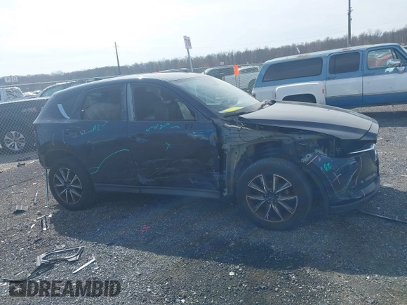 2018 Mazda CX-5 Grand Touring with VIN JM3KFBDM7J0343686, listed as a IAAI auction lot 41813638 with 74,084 mi miles. Bid and sale history available at carsss.com. Image 13.