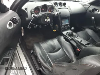 2004 Nissan 350Z Touring z VIN JN1AZ34E84T063971, wystawiony jako Copart lot #57267825 z przebiegiem 131 036 mil mil oraz Szkoda całkowita • Salvage title. Historia ofert i sprzedaży dostępna na DreamBid. Obrazek 8.