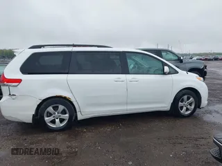 2012 Toyota Sienna LE AAS with VIN 5TDKK3DC3CS208853, listed as a IAAI auction lot 42205012 with 197,286 mi miles. Bid and sale history available at carsss.com. Image 13.