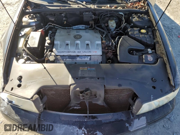 2000 Cadillac Seville Touring STS z VIN 1G6KY5495YU177352, wystawiony jako Copart lot #86020444 z przebiegiem Nie podano mil oraz Szkoda całkowita • Salvage title. Historia ofert i sprzedaży dostępna na DreamBid. Obrazek 11.