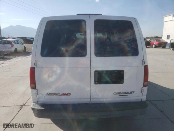 2004 Chevrolet Astro Cargo Van with VIN 1GCDL19X64B109975, listed as a Copart auction lot 70611344 with 129,682 mi miles and Salvage Title. Bid and sale history available at carsss.com. Image 6.