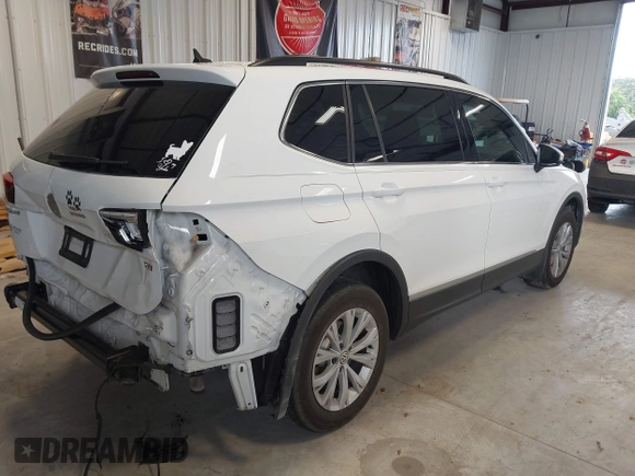 2018 Volkswagen Tiguan SEL z VIN 3VV3B7AX1JM167656, wystawiony jako IAAI lot #42658377 z przebiegiem 74 130 mil mil oraz . Historia ofert i sprzedaży dostępna na DreamBid. Obrazek 4.