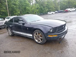 2005 Ford Mustang Deluxe z VIN 1ZVFT80N655234887, wystawiony jako IAAI lot #42521363 z przebiegiem 164 011 mil mil oraz . Historia ofert i sprzedaży dostępna na DreamBid. Obrazek 1.