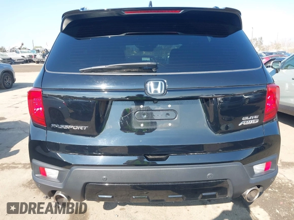 2023 Honda Passport Elite z VIN 5FNYF8H01PB005725, wystawiony jako IAAI lot #41457435 z przebiegiem 39 562 mil mil oraz . Historia ofert i sprzedaży dostępna na DreamBid. Obrazek 16.
