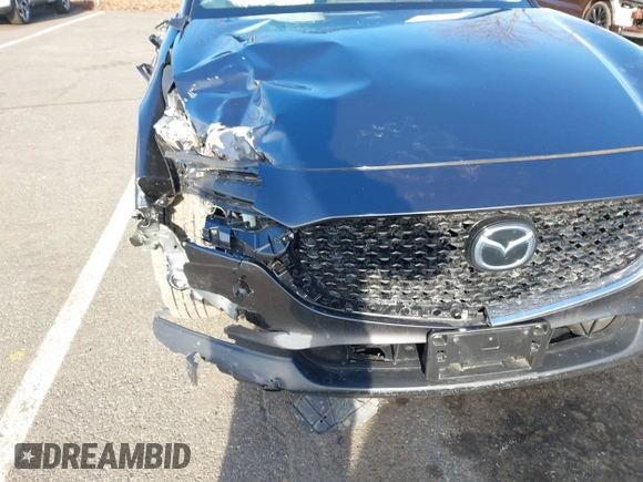 2022 Mazda CX-30 S Premium with VIN 3MVDMBDL9NM403273, listed as a IAAI auction lot 41607227 with Not Provided miles and . Bid and sale history available at carsss.com. Image 6.
