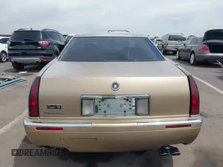 1999 Cadillac Eldorado ESC z VIN 1G6EL12Y5XU603764, wystawiony jako IAAI lot #42368692 z przebiegiem 154 613 mil mil oraz . Historia ofert i sprzedaży dostępna na DreamBid. Obrazek 16.