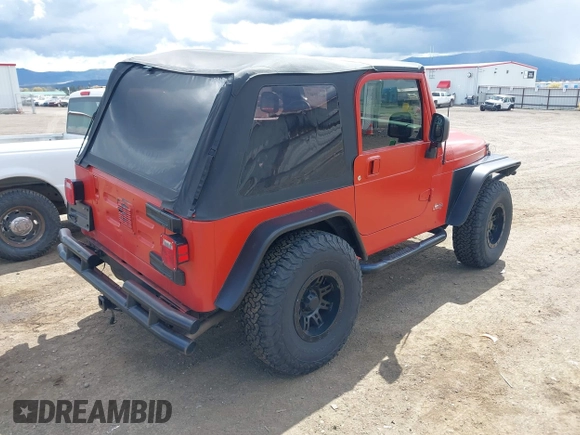 2005 Jeep Wrangler X with VIN 1J4FA39S35P358201, listed as a IAAI auction lot 42080407 with 130,110 mi miles. Bid and sale history available at carsss.com. Image 4.