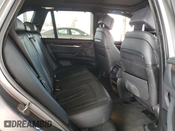 2014 BMW X5 xDrive50i z VIN 5UXKR6C58E0C03414, wystawiony jako Copart lot #47437935 z przebiegiem 126 402 mil mil oraz Szkoda całkowita • Salvage title. Historia ofert i sprzedaży dostępna na DreamBid. Obrazek 10.