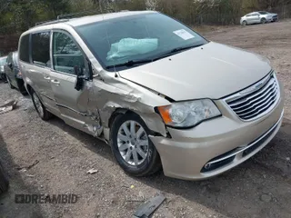 2014 Chrysler Town & Country Touring z VIN 2C4RC1BG8ER453780, wystawiony jako IAAI lot #41738925 z przebiegiem 172 891 mil mil oraz . Historia ofert i sprzedaży dostępna na DreamBid. Obrazek 1.