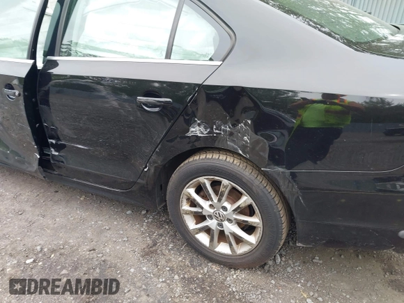 2013 Volkswagen Jetta SE with VIN 3VWDP7AJ7DM212911, listed as a IAAI auction lot 42307323 with 128,745 mi miles and . Bid and sale history available at DreamBid. Image 12.