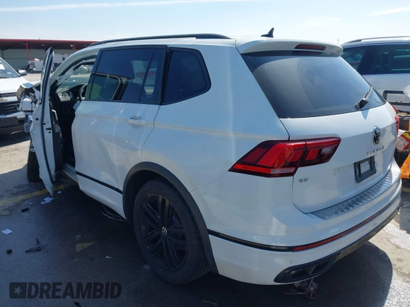 2022 Volkswagen Tiguan SE R-Line Black with VIN 3VVCB7AX9NM009779, listed as a IAAI auction lot 41696952 with Not provided miles and . Bid and sale history available at DreamBid. Image 3.