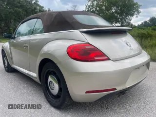 2013 Volkswagen Beetle 2.5L with VIN 3VW5X7AT2DM825928, listed as a Copart auction lot 66500855 with 48,795 mi miles and Salvage title. Bid and sale history available at DreamBid. Image 3.